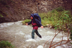 Pete crossing the river.